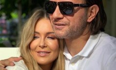 Małgorzata Rozenek-Majdan pozuje z synkiem Henryczkiem. Dzidziuś pokazuje śmieszna minkę